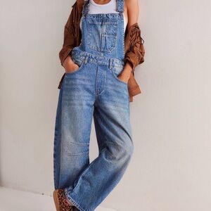 We The Free Blue Denim Overalls with Adjustable Straps and Barrel fit NWOT.
